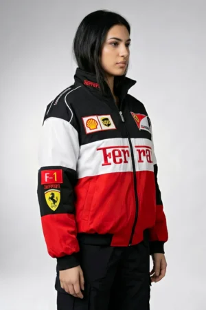 Side profile of the Red x White Ferrari F1 Racing Jacket showing sleek contrast panels and high-density motorsport patches. A versatile Unisex F1 Racing Jacket designed for a sharp, aerodynamic look