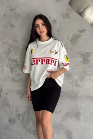 Woman wearing black oversized Ferrari T-shirt front view