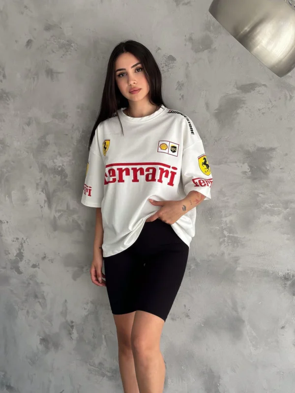 Woman wearing black oversized Ferrari T-shirt front view