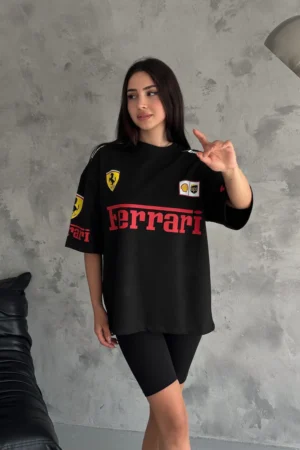 Woman wearing black oversized Ferrari T-shirt front view