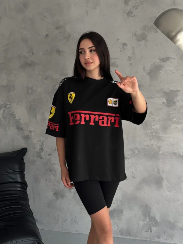 Woman wearing black oversized Ferrari T-shirt front view