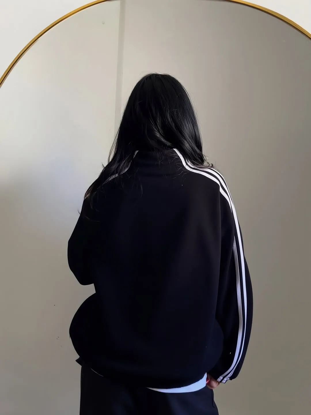 Back View of Black CNY Jacket showing oversized fit and premium stitching by Drip Mania