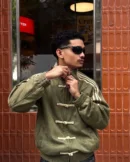 Front view of the Olive Green Chinese New Year Jacket by Drip Mania with premium embroidery.