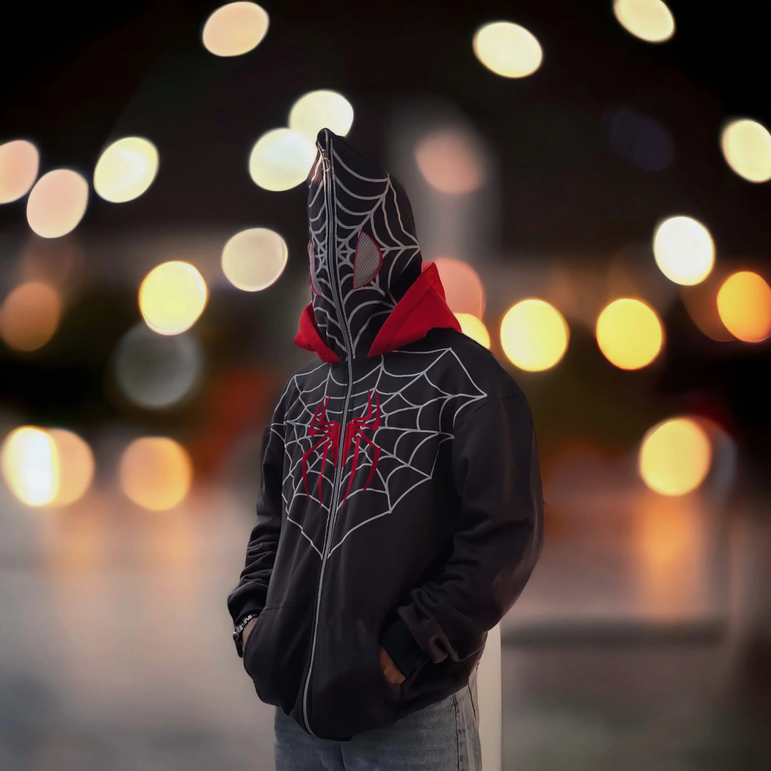 Close-up of Spiderman Hoodie logo on hoodie chest